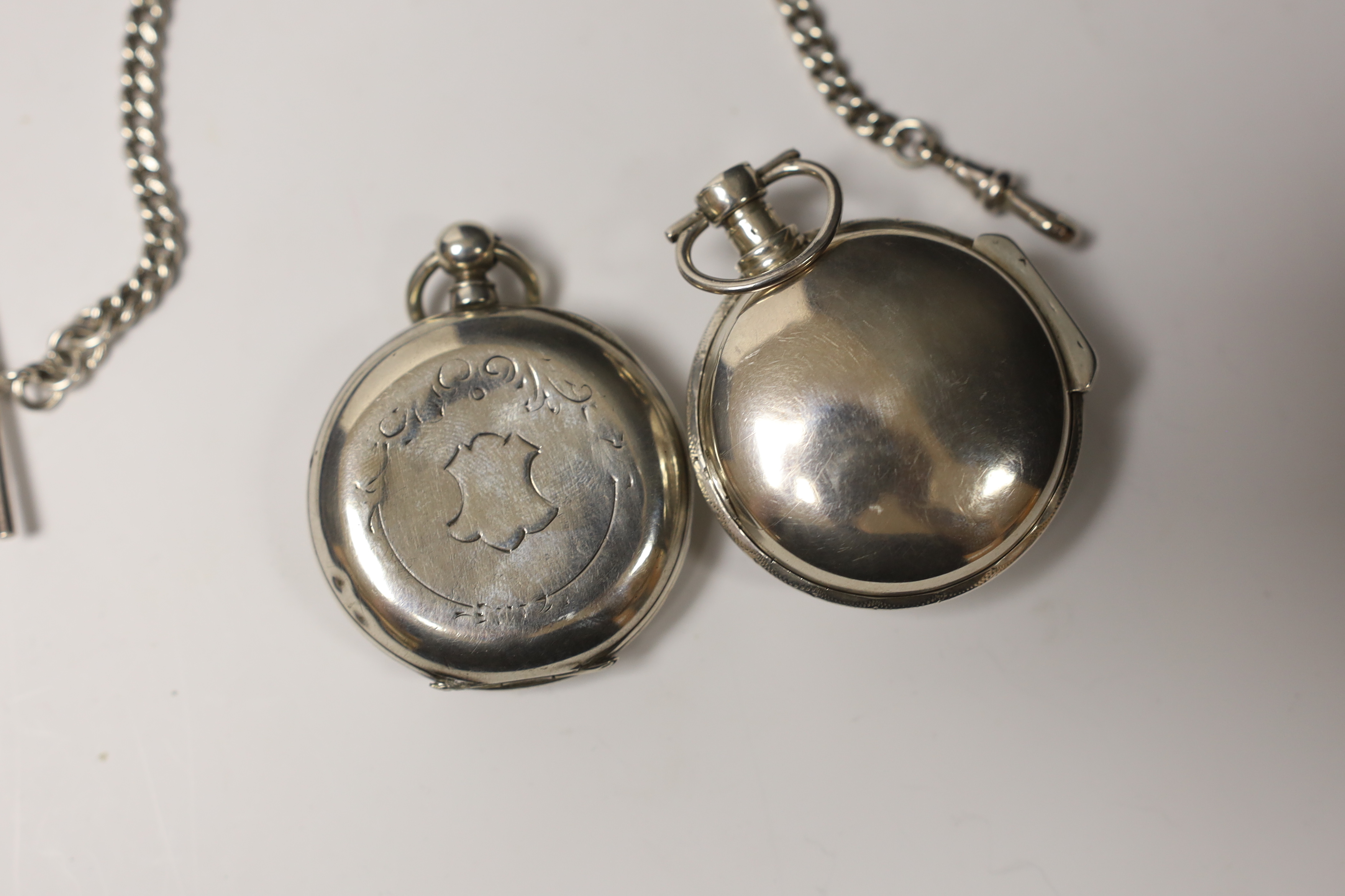 A continental white metal keywind open face pocket watch, with Roman dial, case diameter 46mm, together with French white metal open face keywind pocket watch and a silver albert.